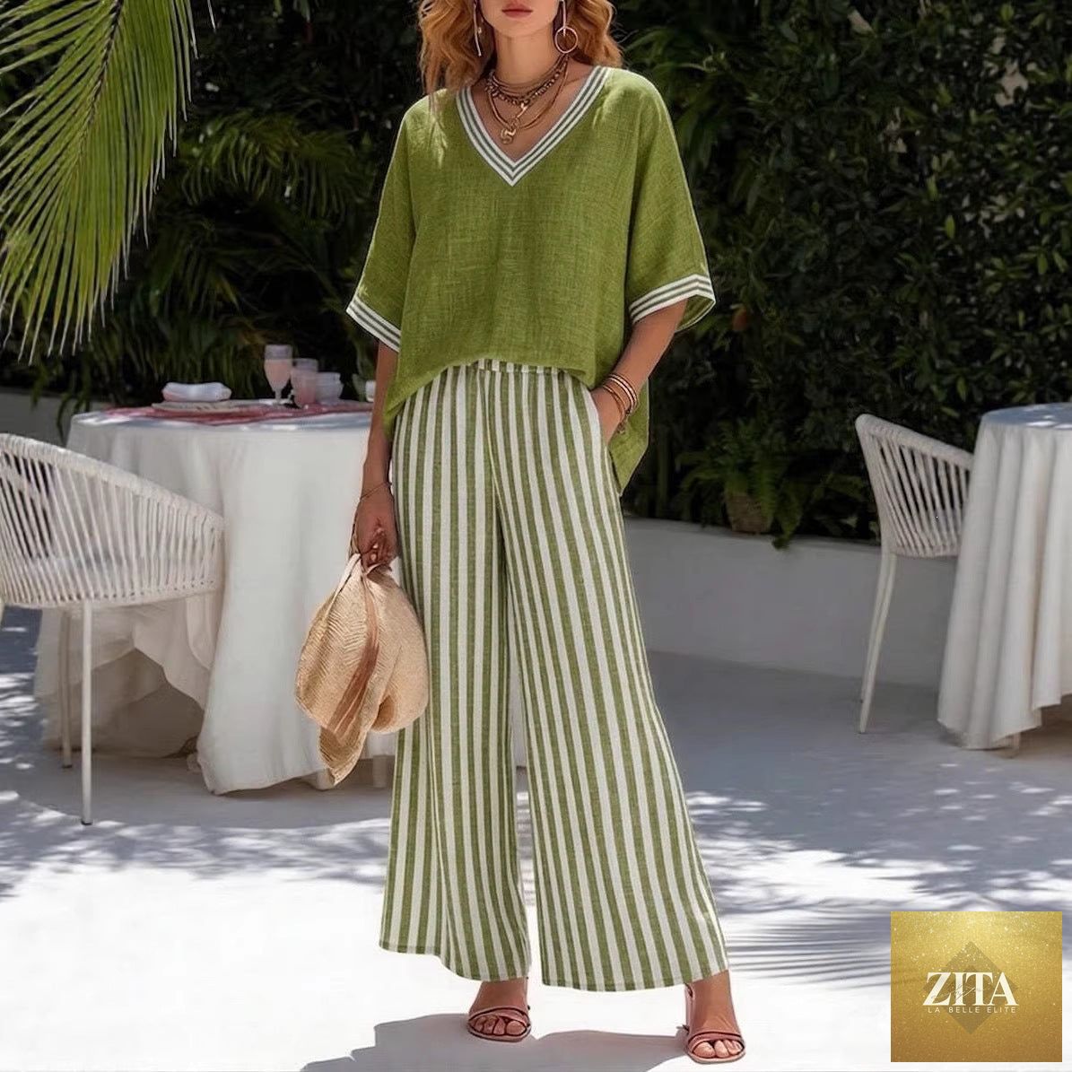 Women's striped tunic top and casual trousers two-piece set by Zita La Belle Elite, featuring comfortable fit and stylish design.