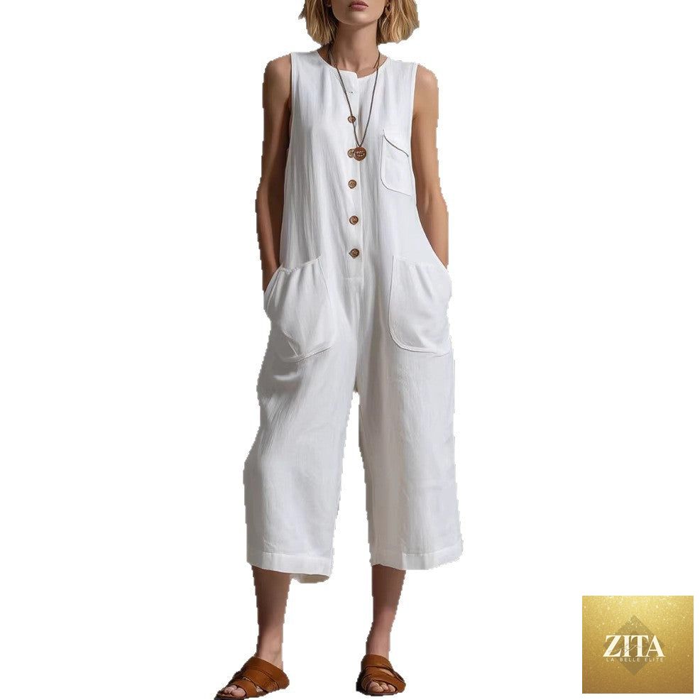 Retro sleeveless cotton-linen wide-leg cropped jumpsuit with a relaxed fit, shown on a model in a stylish indoor setting.