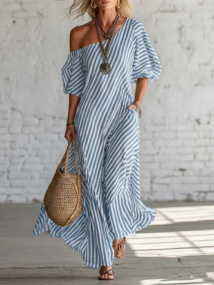Women's striped off-shoulder midi dress by FitiqueFit, stylish and elegant activewear with a fitted design and bold stripe pattern.