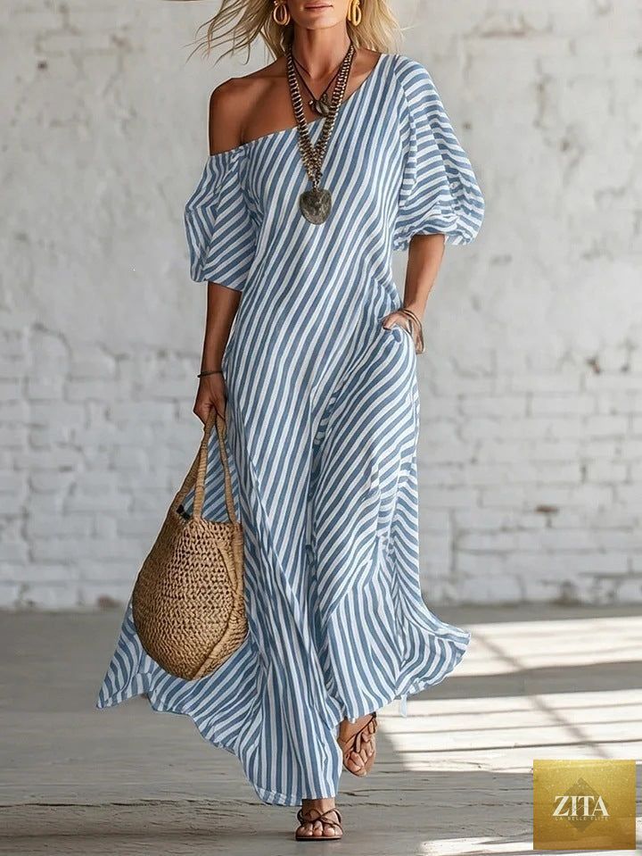 Women's striped off-shoulder midi dress by FitiqueFit, stylish and elegant activewear with a fitted design and bold stripe pattern.