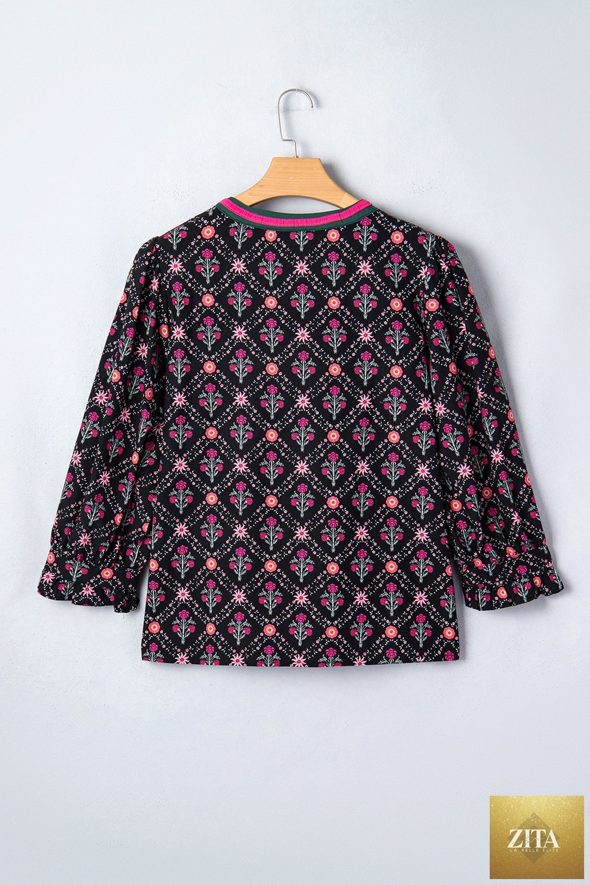 Black contrast V-neckline blouse with bracelet sleeves and vintage floral pattern, stylish top from Wild and Free Boutique.
