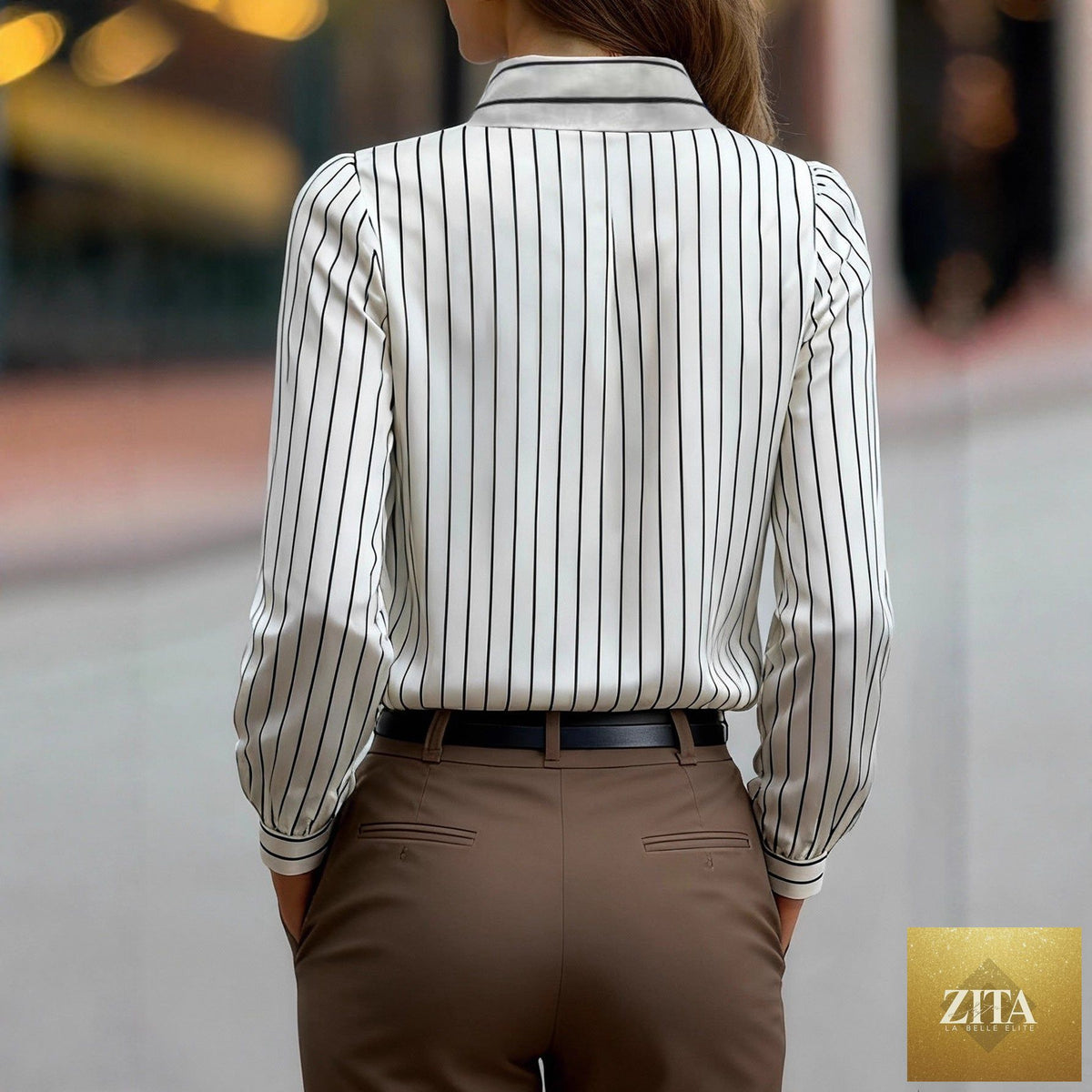 Black and white striped silky satin lapel shirt with a classic collar and smooth fabric, stylish for casual or formal wear.