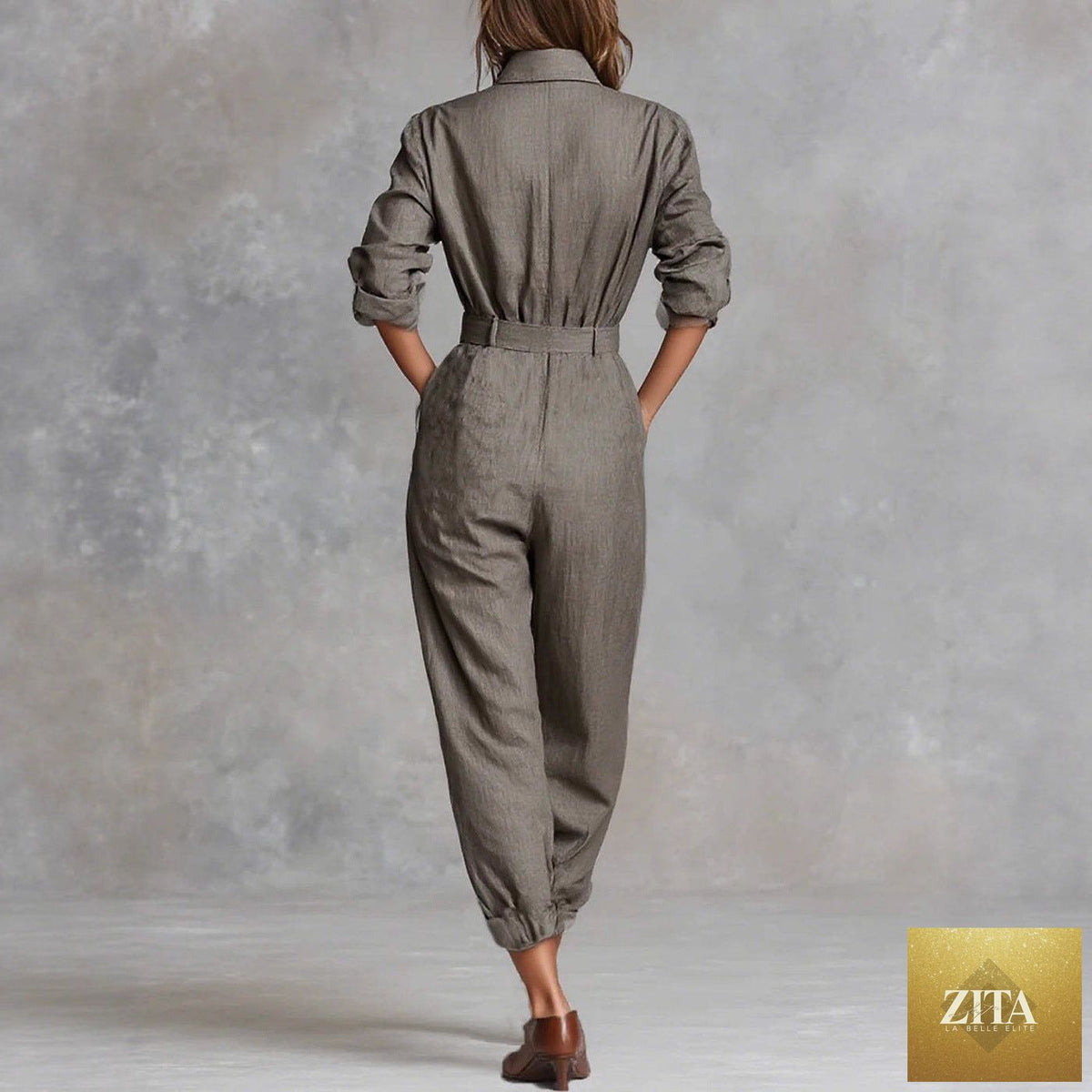 Women's long-sleeved lapel jumpsuit by My Store, featuring a tailored fit and stylish design, shown on a model.