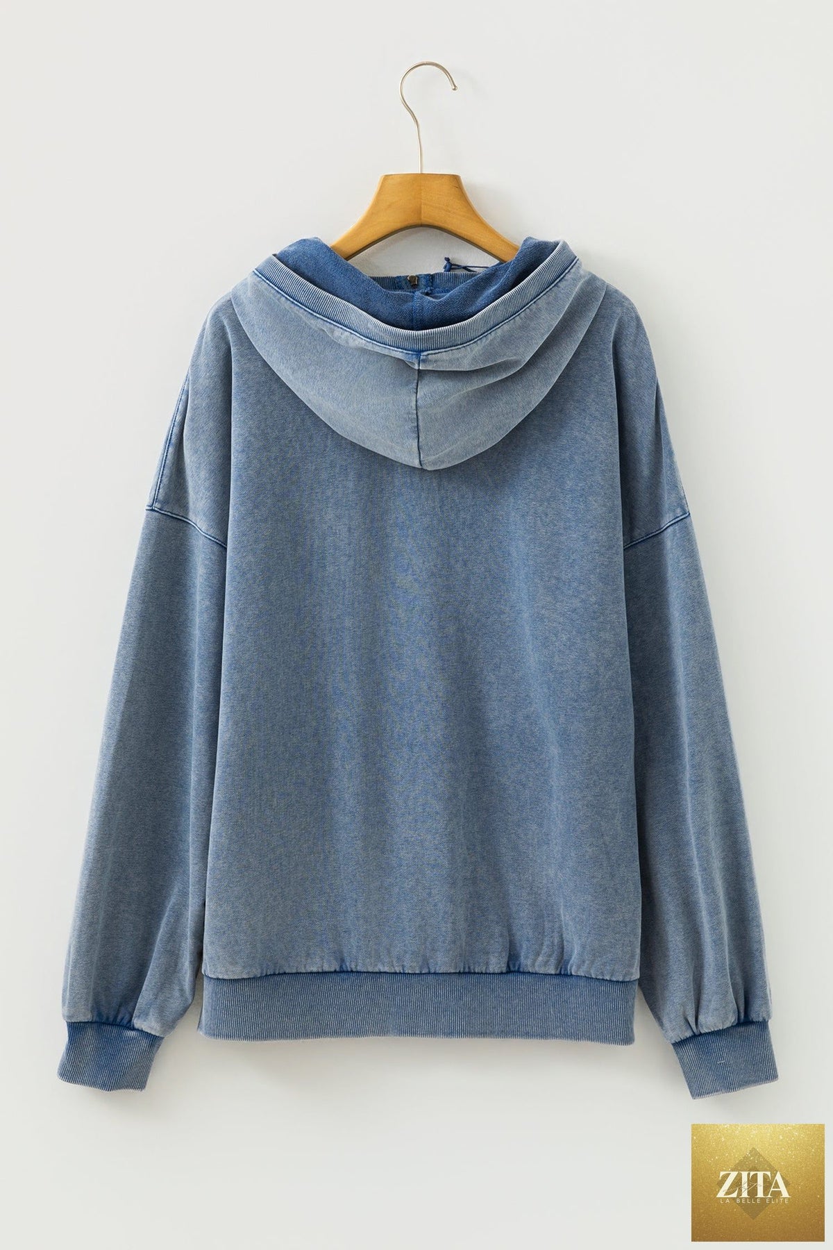 Black half zip hoodie featuring kangaroo pocket and mineral wash finish, casual baggy fit, from Wild and Free Boutique.