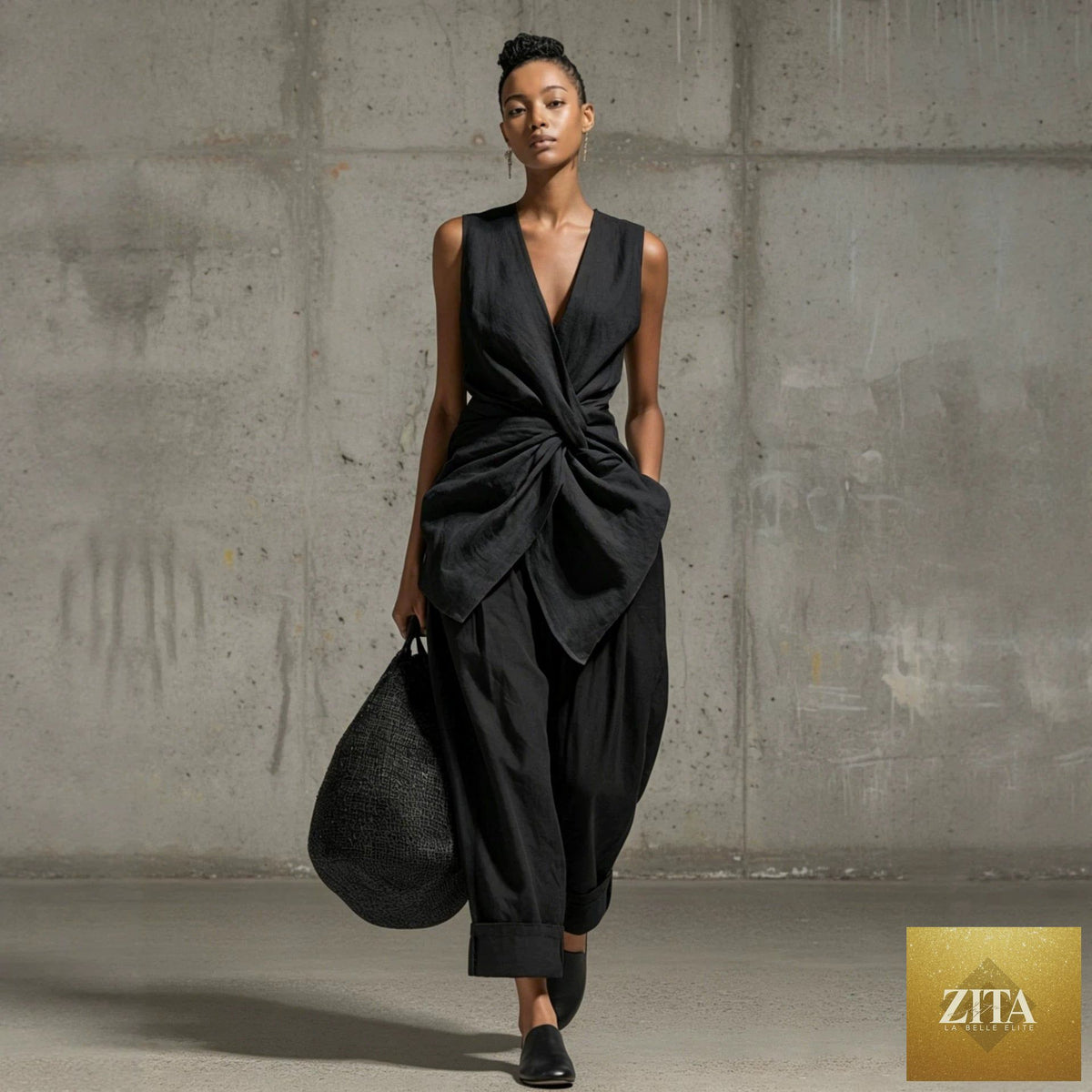 Women's casual tie-front V-neck sleeveless top and wide-leg pants set by FitiqueFit, shown in a relaxed, stylish fit.