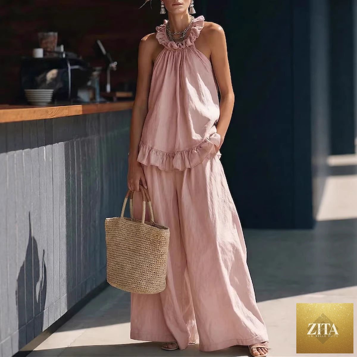 Zita La Belle Elite halterneck loose two-piece casualwear set with pleated design and asymmetric pockets, perfect for relaxed style.
