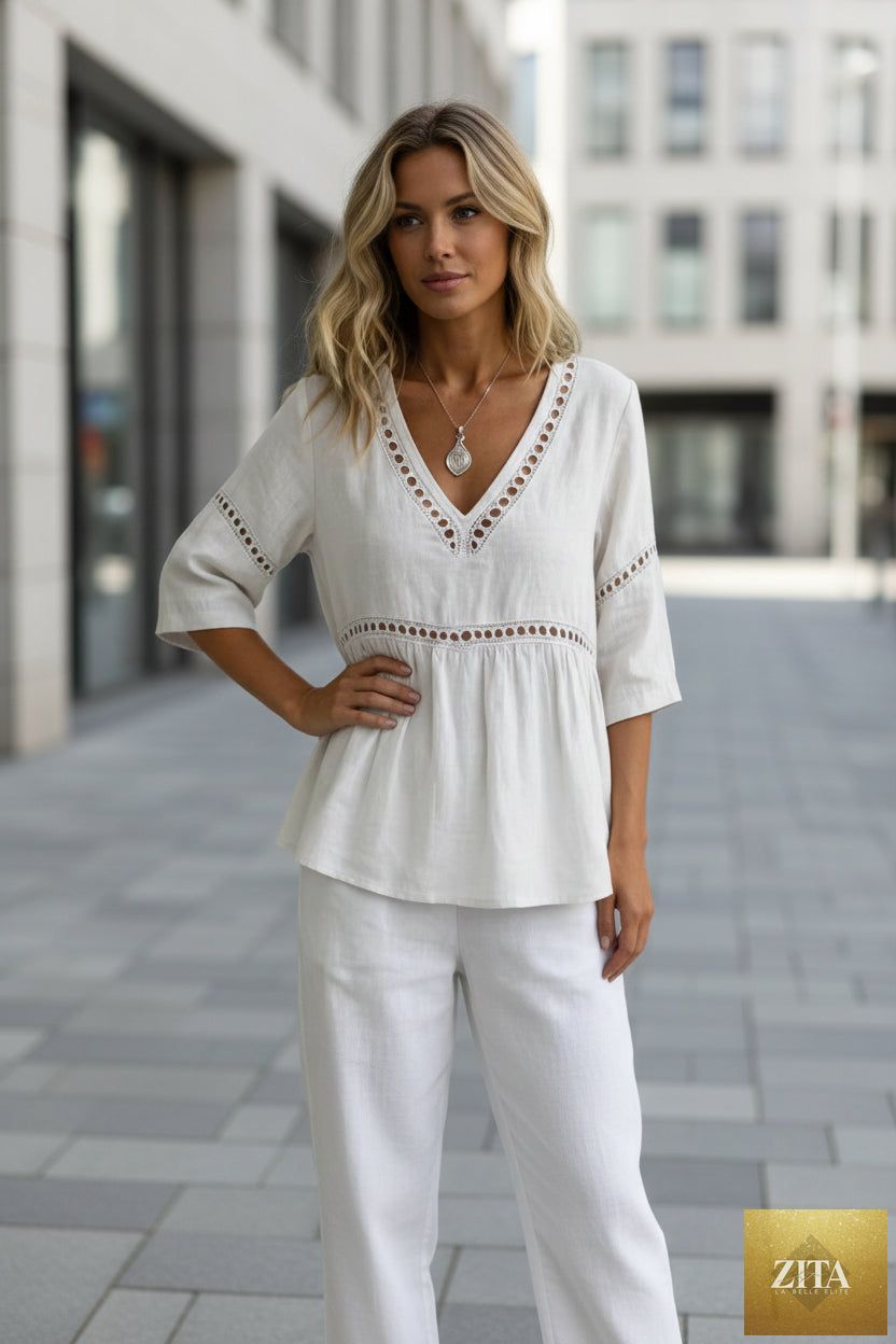 Women's V-neck hollow-out fringe cotton-linen top by Zita La Belle Elite, casualwear with a stylish V-neck and textured fringe details.