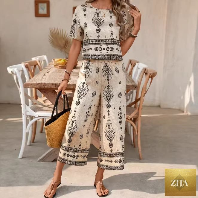 Women's ethnic print contrast two-piece casualwear set by Zita La Belle Elite, includes a top and straight-leg pants.