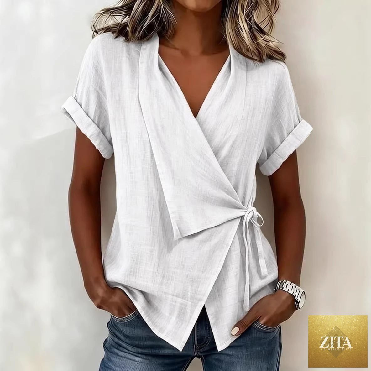 Women's casual linen top with lapel collar and lace-up front, short sleeves, by Zita La Belle Elite, shown in natural fabric detail.