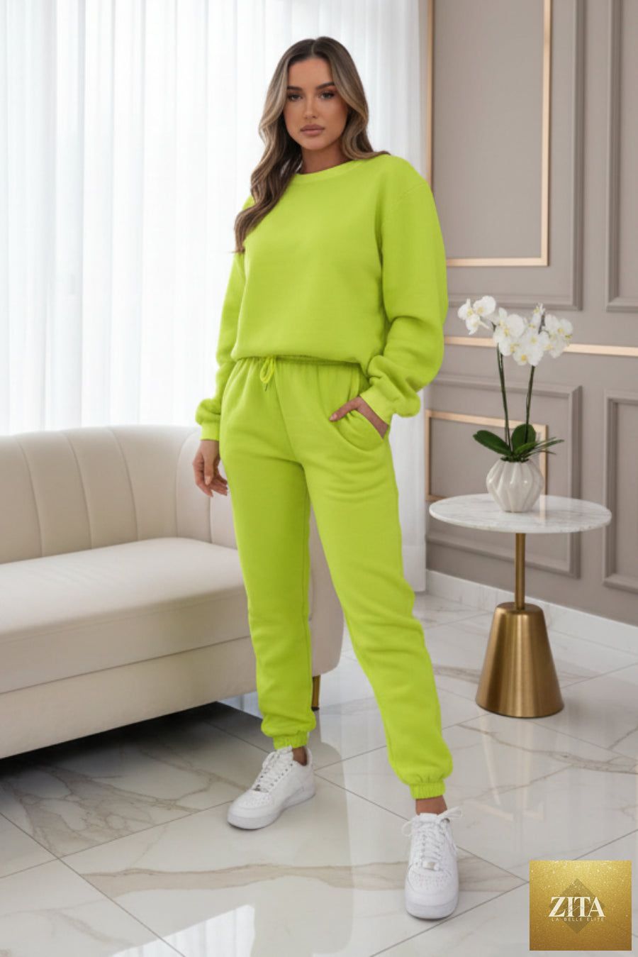 Women's oversized drop-shoulder sweatshirt and jogger pants sweatsuit set by MERIDGE, casual two-piece activewear ensemble.