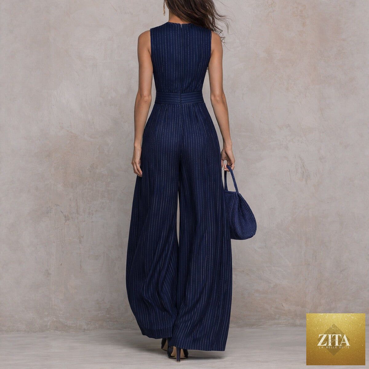 Women's sleeveless striped wide-leg jumpsuit with pockets by Zita La Belle Elite, casualwear with comfortable fit and stylish design.