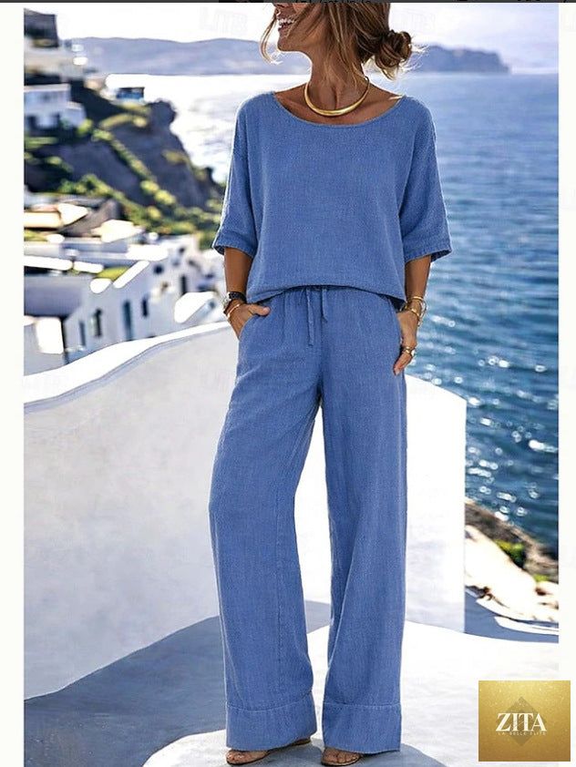 Women's cotton linen resort set by Zita La Belle Elite featuring a short sleeve top and wide-leg pants, perfect for summer wear.