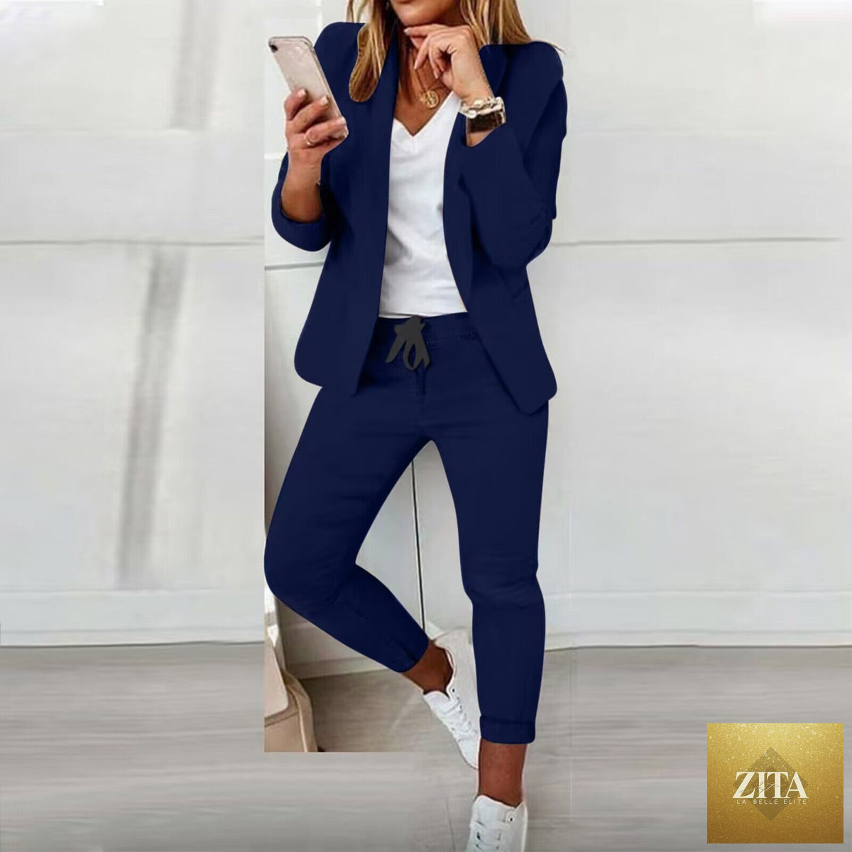 Women’s casualwear blazer and drawstring pants suit set by FitiqueFit, featuring a notch-lapel blazer and matching relaxed pants.