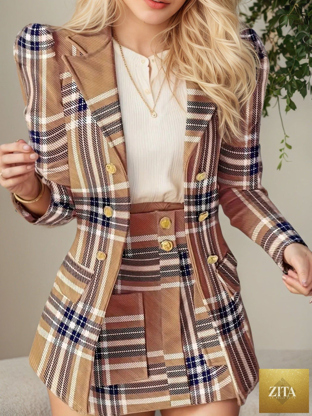 Women’s plaid skirt suit set by FitiqueFit featuring an elegant, casualwear ensemble with a fitted blazer and matching pleated skirt.