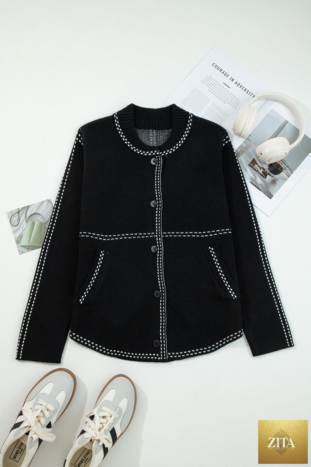 Black contrast trim button-up sweater cardigan from Wild and Free Boutique, featuring a classic design and knit fabric.