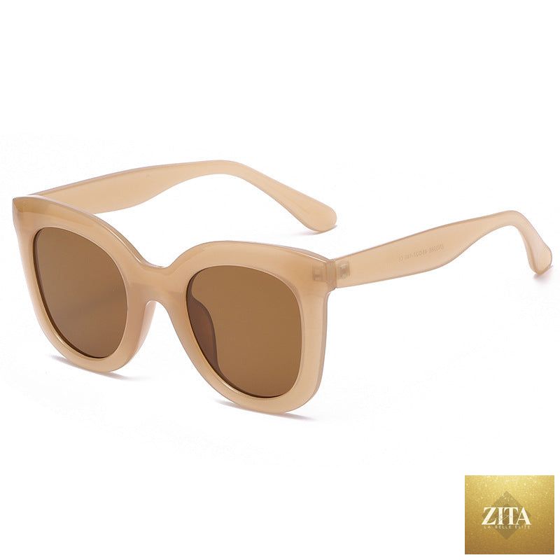 Large rim sunglasses by FitiqueFit, oversized women’s fashion shades with dark tinted lenses and bold black frames.