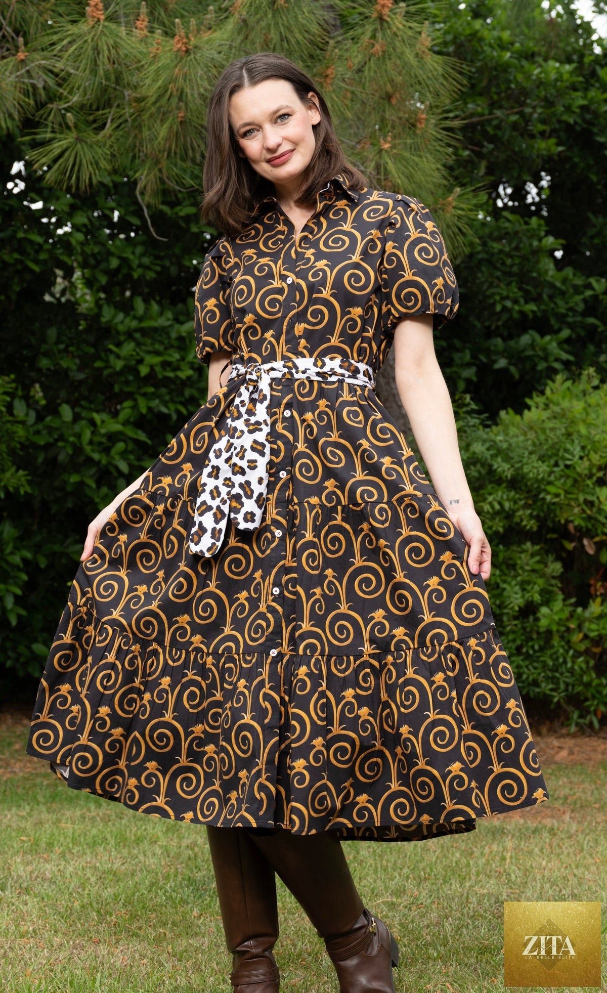 Dizzy-Lizzie Litchfield black dress with gold swirl print, stylish and elegant dress design for women.