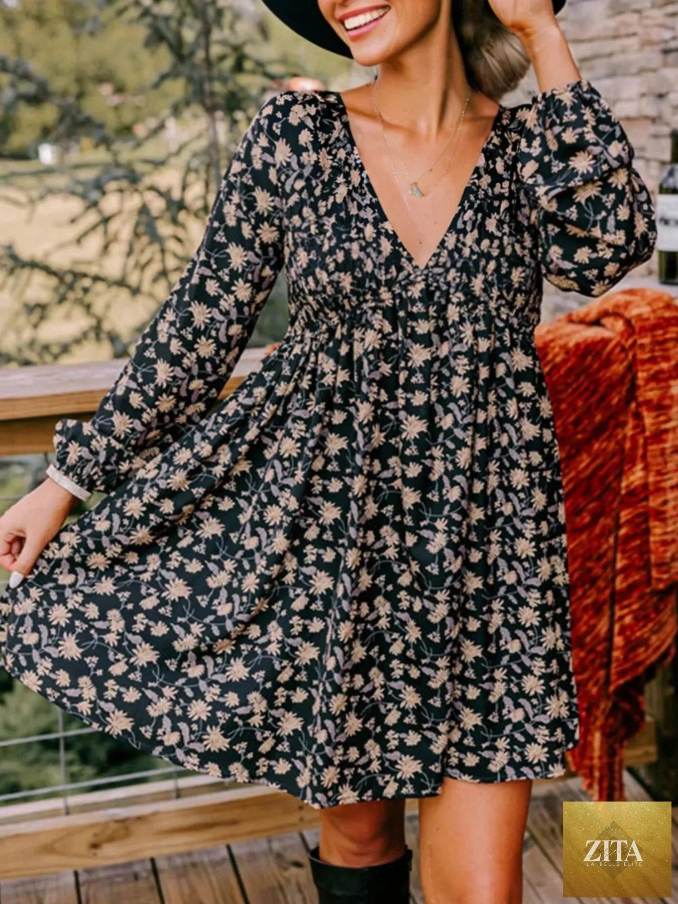 Floral deep V neck smocked bust bubble sleeve babydoll dress with flowy skirt, stylish and feminine, by Shopiebay.