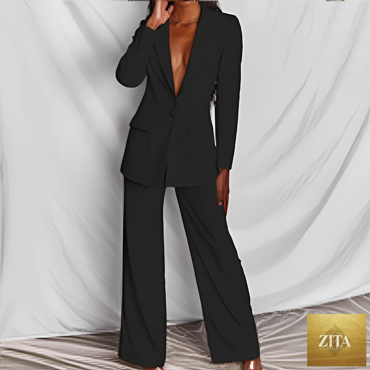 FitiqueFit two-piece blazer and straight-leg trousers suit, featuring a tailored lapel button-down blazer and matching trousers.