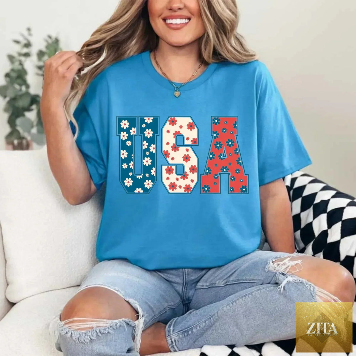 USA Floral T-Shirt featuring a colorful Independence Day flower design by Adorb Custom Tees, worn by a person.