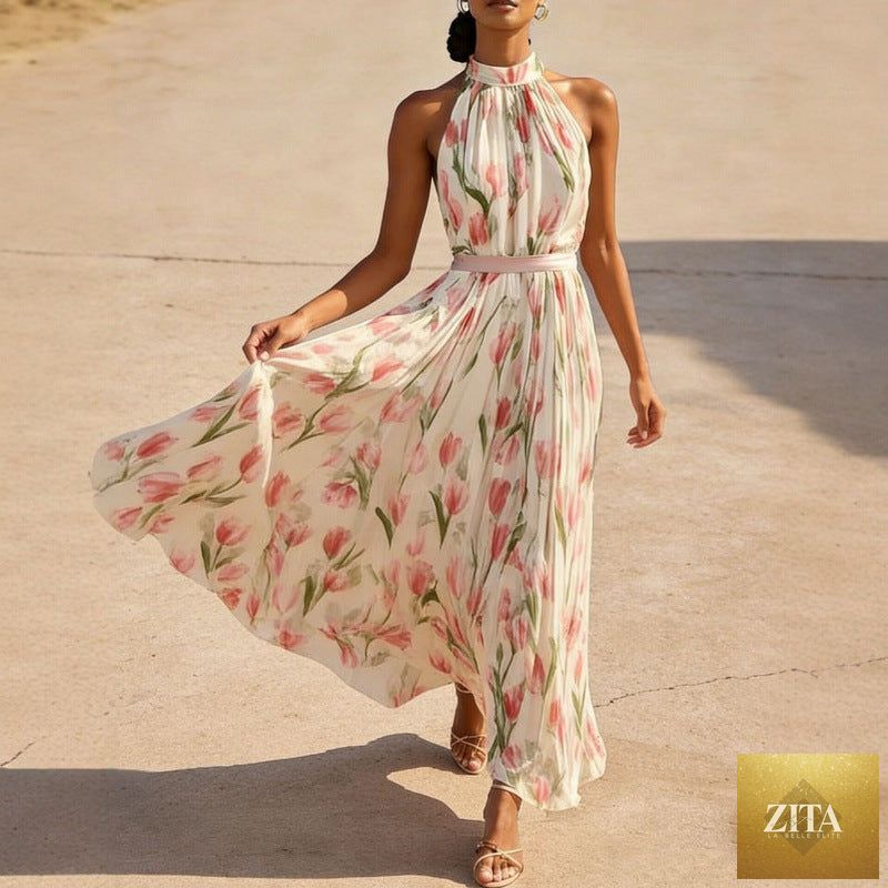 Women's FitiqueFit halterneck high-waist swing dress with floral and solid prints, casualwear style, shown on a model.