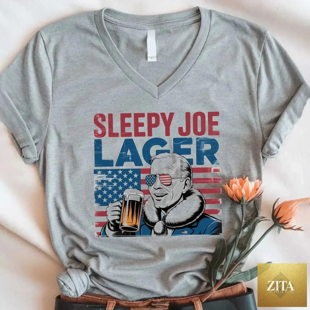 Adorb Custom Tees Sleepy Joe Lager V-Neck T-Shirt featuring Biden-inspired humorous beer design for 4th of July celebrations.