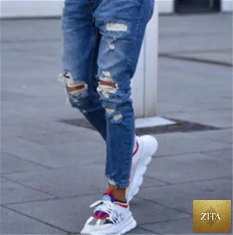 Mandotos men's jeans with classic hole design, showcasing distressed denim and casual fit, ideal for everyday wear.