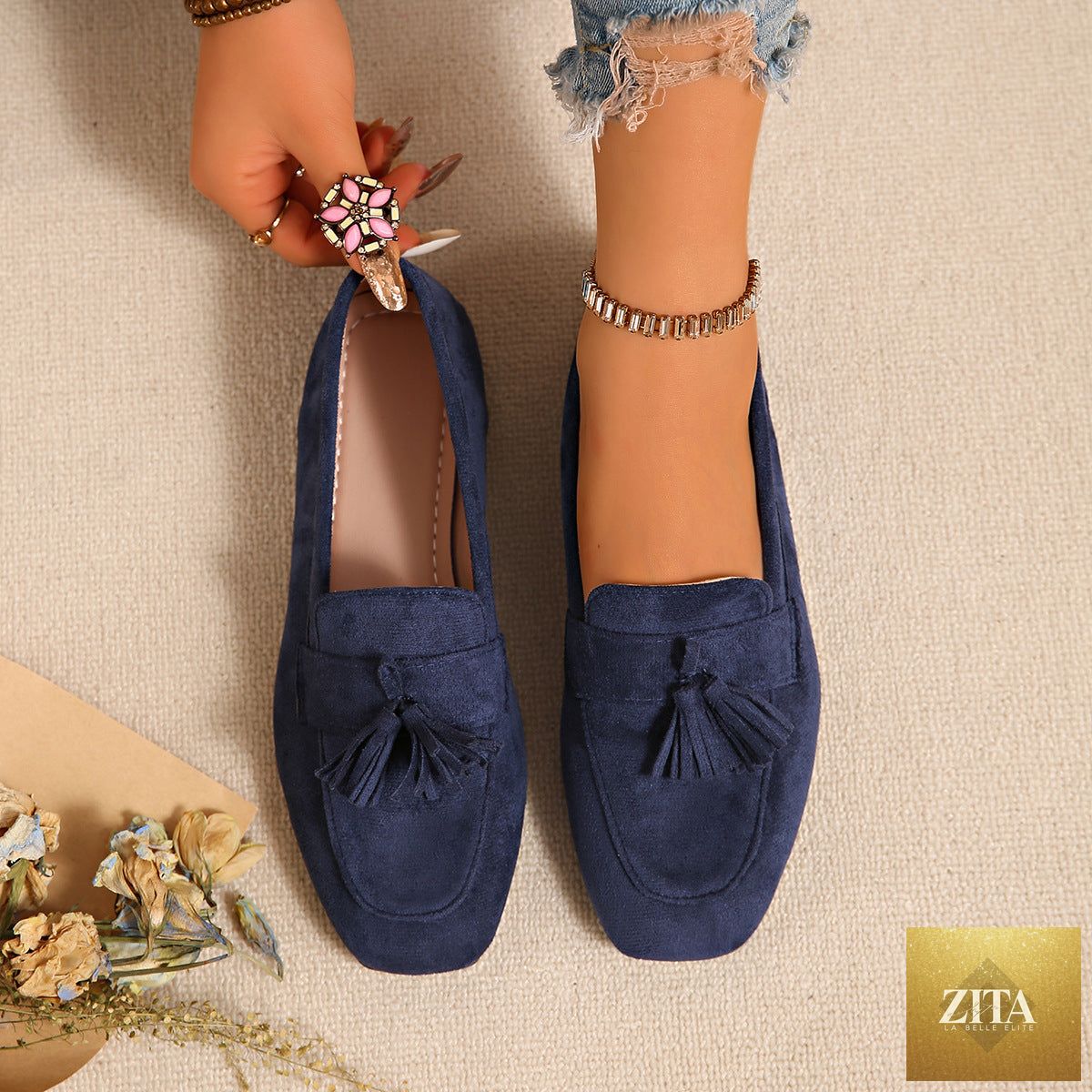 Women's square toe tassel slip-on loafers by FitiqueFit featuring suede material and flat casual design.
