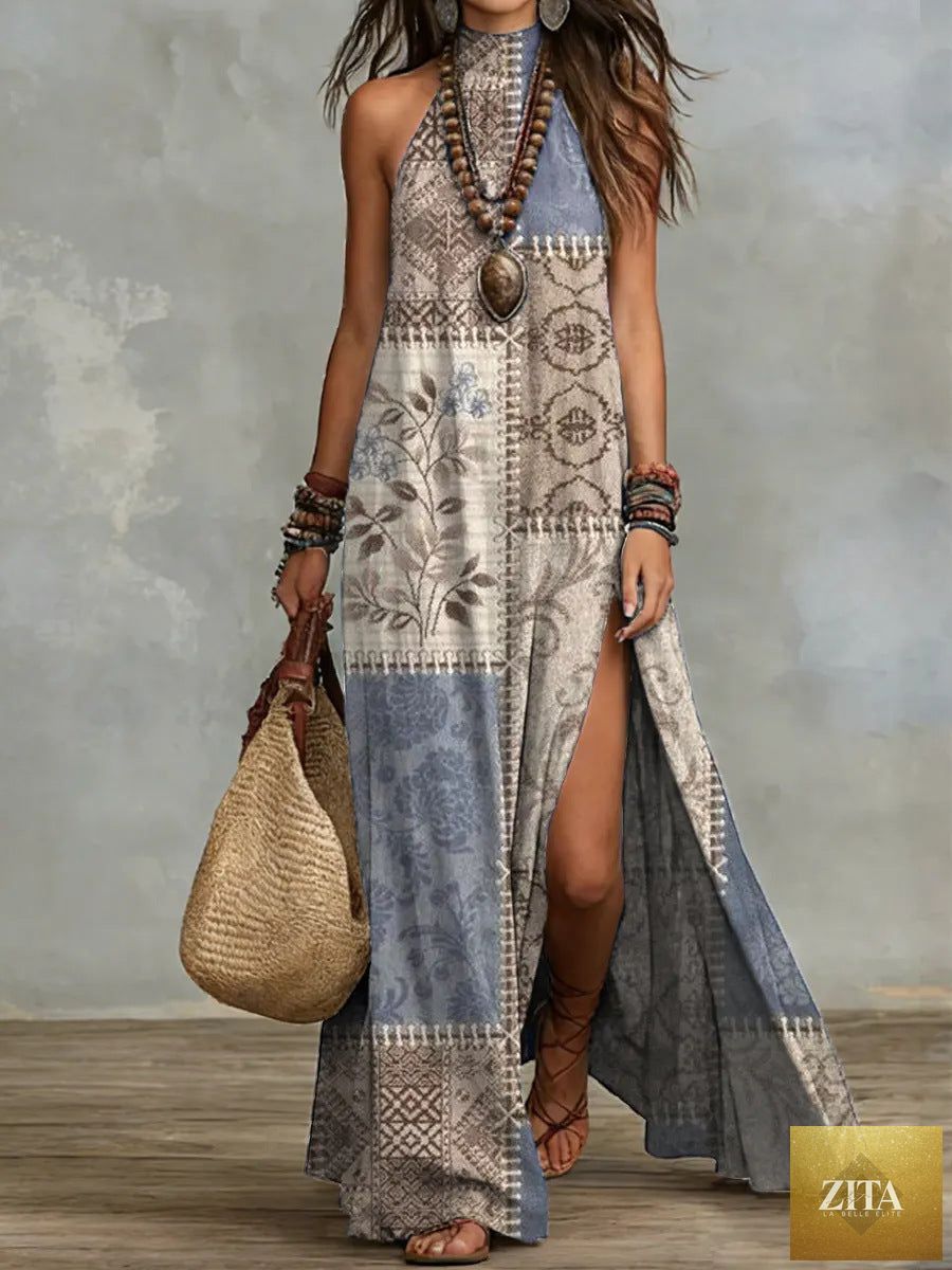 Women's sleeveless floral print maxi dress by Zita La Belle Elite, featuring a split design and flowing fabric.