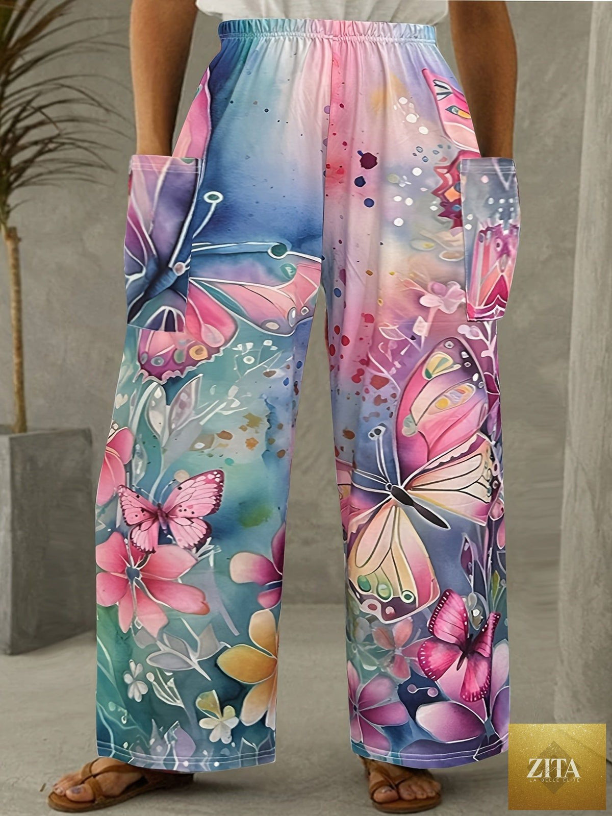 Plus size casual pants with butterfly print from Trendy Attic Store01, featuring a comfortable fit and stylish design.