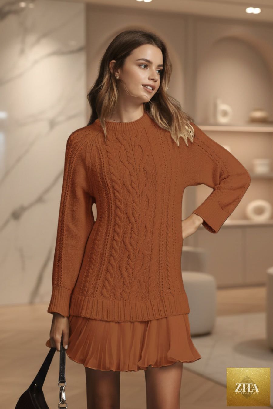 Cream-colored cable knit sweater from FitiqueFit with an oversized round neck, cozy and stylish for cold weather.