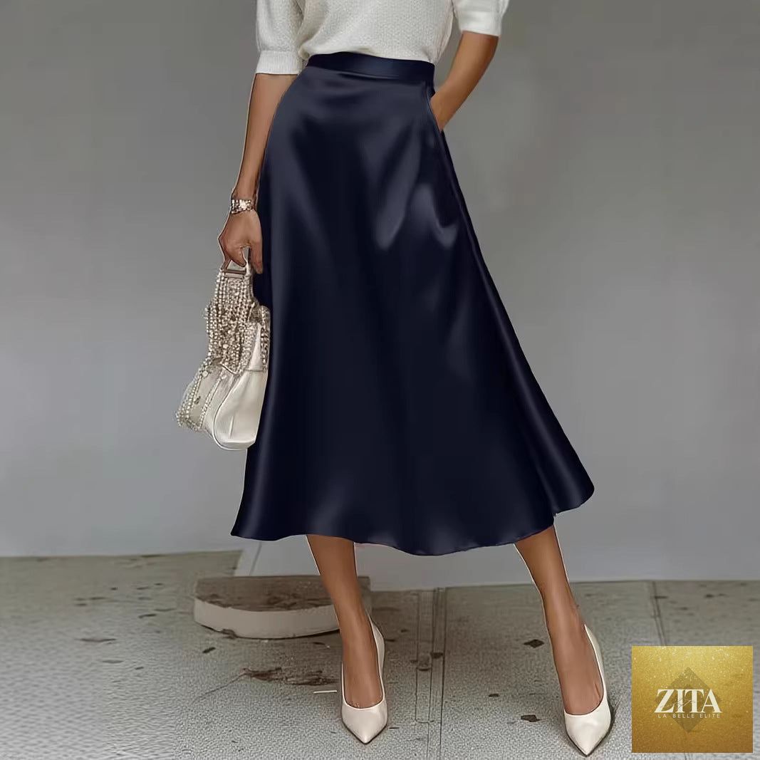 Women's satin solid color mid-length skirt by Zita La Belle Elite, featuring a smooth fabric with slight stretch and elegant design.