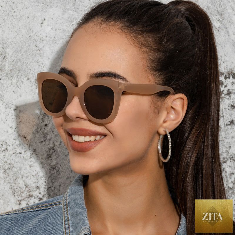 Large rim sunglasses for women by FitiqueFit, oversized fashion shades with bold frames and dark tinted lenses.
