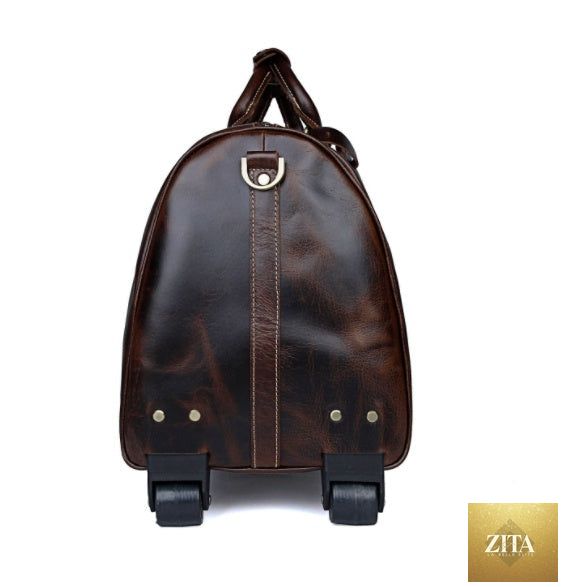 Large capacity cowhide trolley travel bag by Social Buzz eSIMs with sturdy wheels and handles, ideal for long trips and travel convenience.