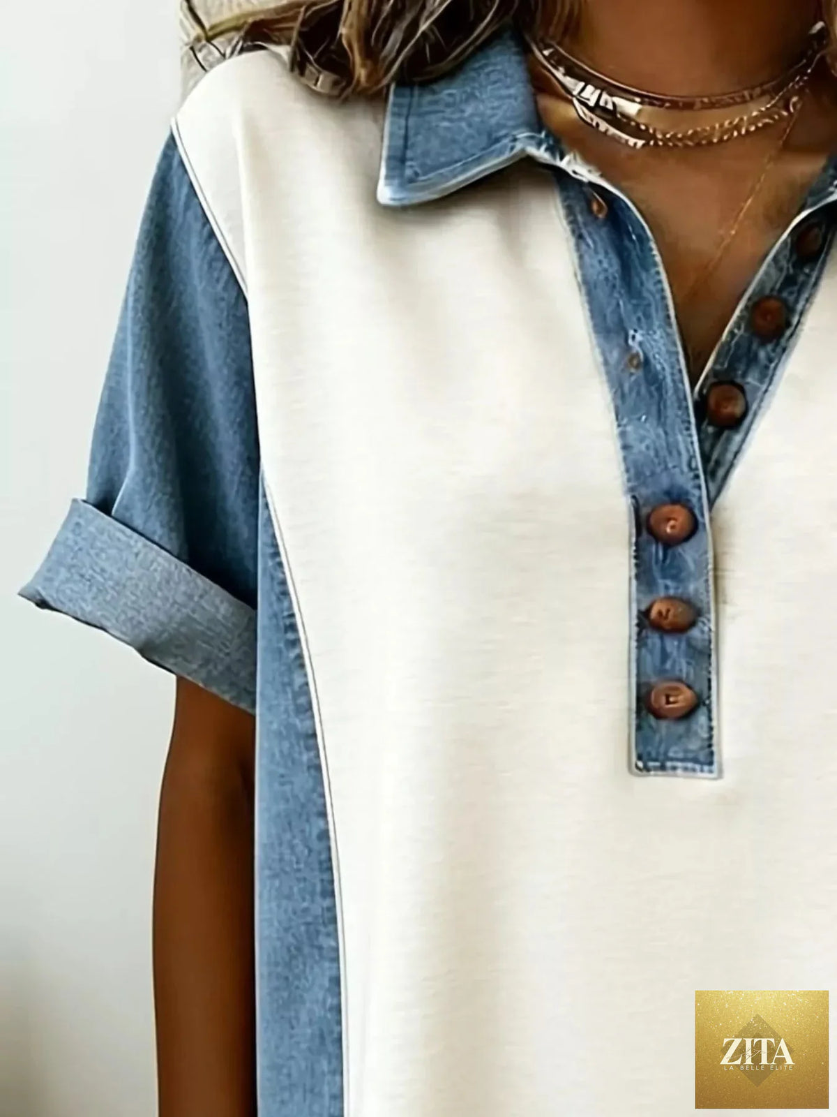 Denim patchwork button-front mini dress by Shopiebay featuring a fitted silhouette and stylish patchwork details.