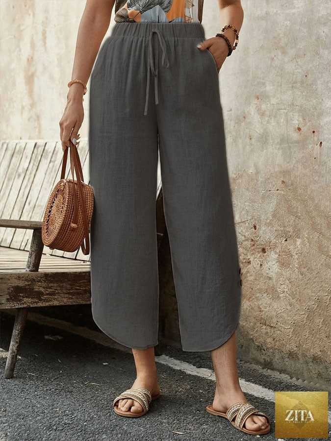 Women's cotton-linen cropped drawstring casual pants by FitiqueFit, featuring a relaxed fit and comfortable waistband.
