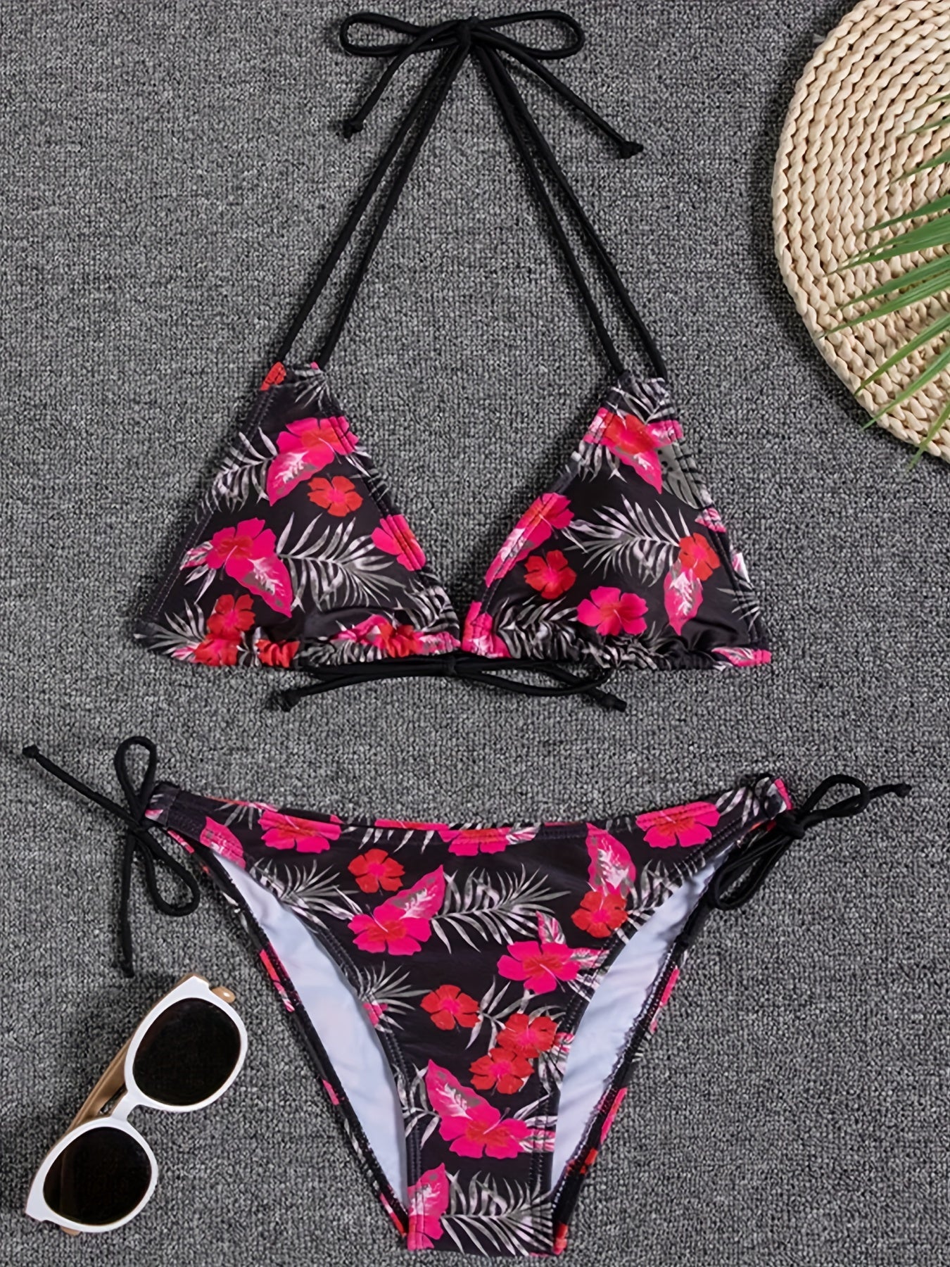 Sunset Bloom 2-piece bikini set for women featuring vibrant floral print, halter neck, tie-back, and high-cut bottoms for summer beachwear.