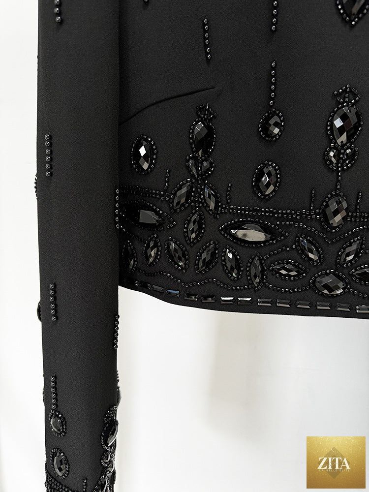 Zita La Belle Elite fashion outfit featuring a short top with heavy industry beads and diamond inlay, paired with a long skirt.