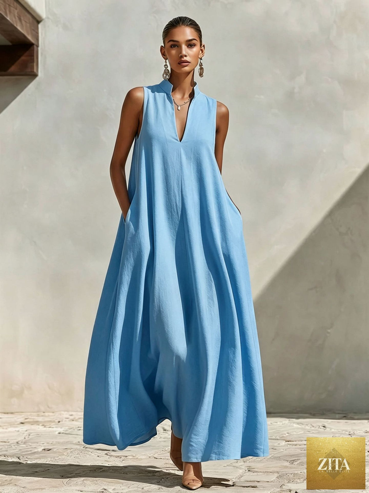 Linen blend sleeveless maxi dress with stand collar in six colors, featuring a relaxed fit and side pockets from FitiqueFit.