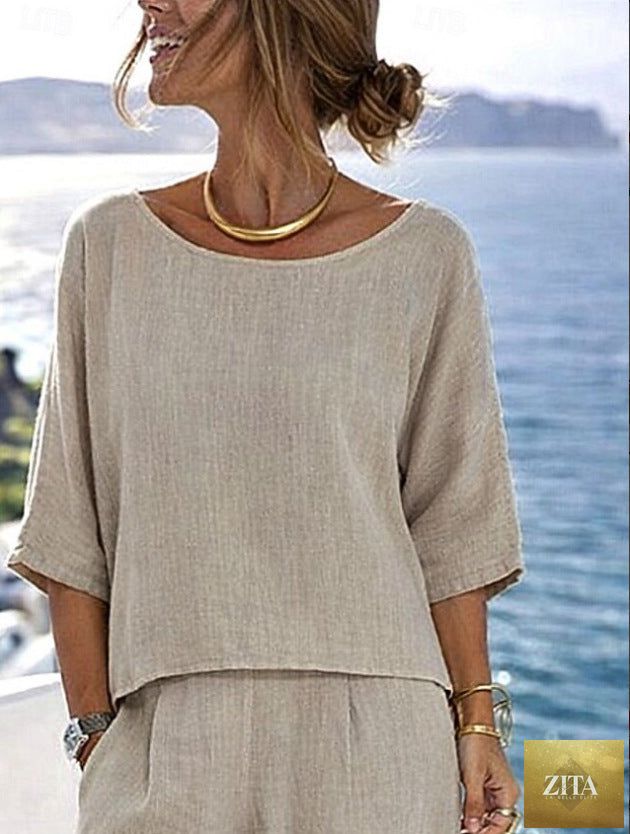 Women’s cotton linen resort set by Zita La Belle Elite, featuring a short sleeve top and wide-leg pants in a relaxed fit.