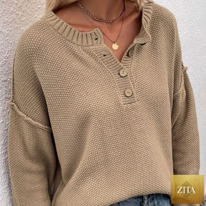 Zita La Belle Elite solid color V-neck pullover knit sweater with relaxed distressed fit, casualwear, shown in a natural pose.