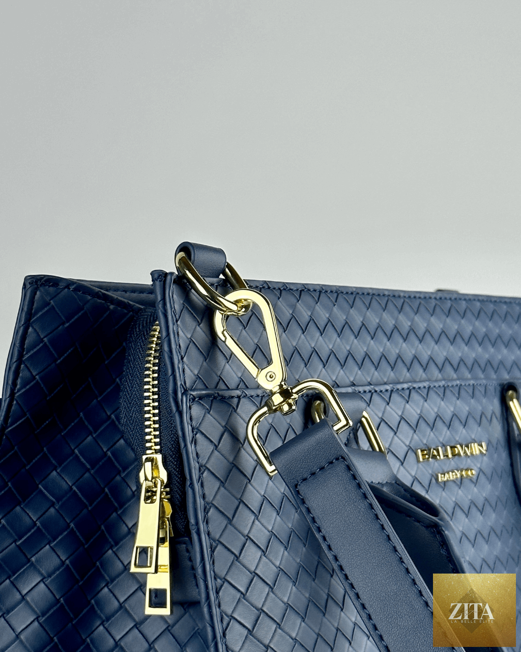 Cobalt blue Baldwin Baby Company Montrose Diaper Bag tote with hardware details, spacious and stylish for parents on the go.