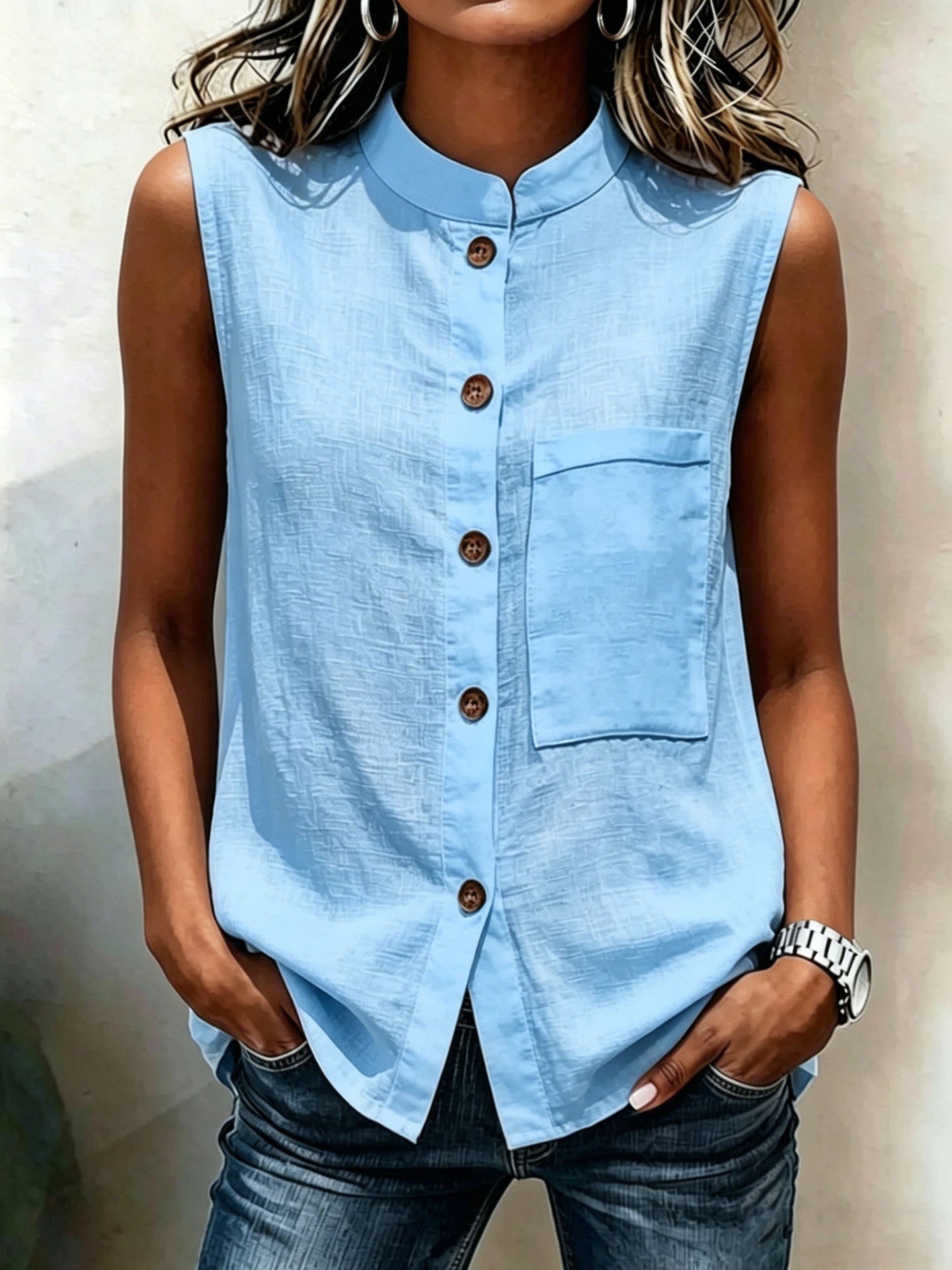 Women's sleeveless crop top by FitiqueFit featuring buttoned pockets and solid color, ideal for casualwear.