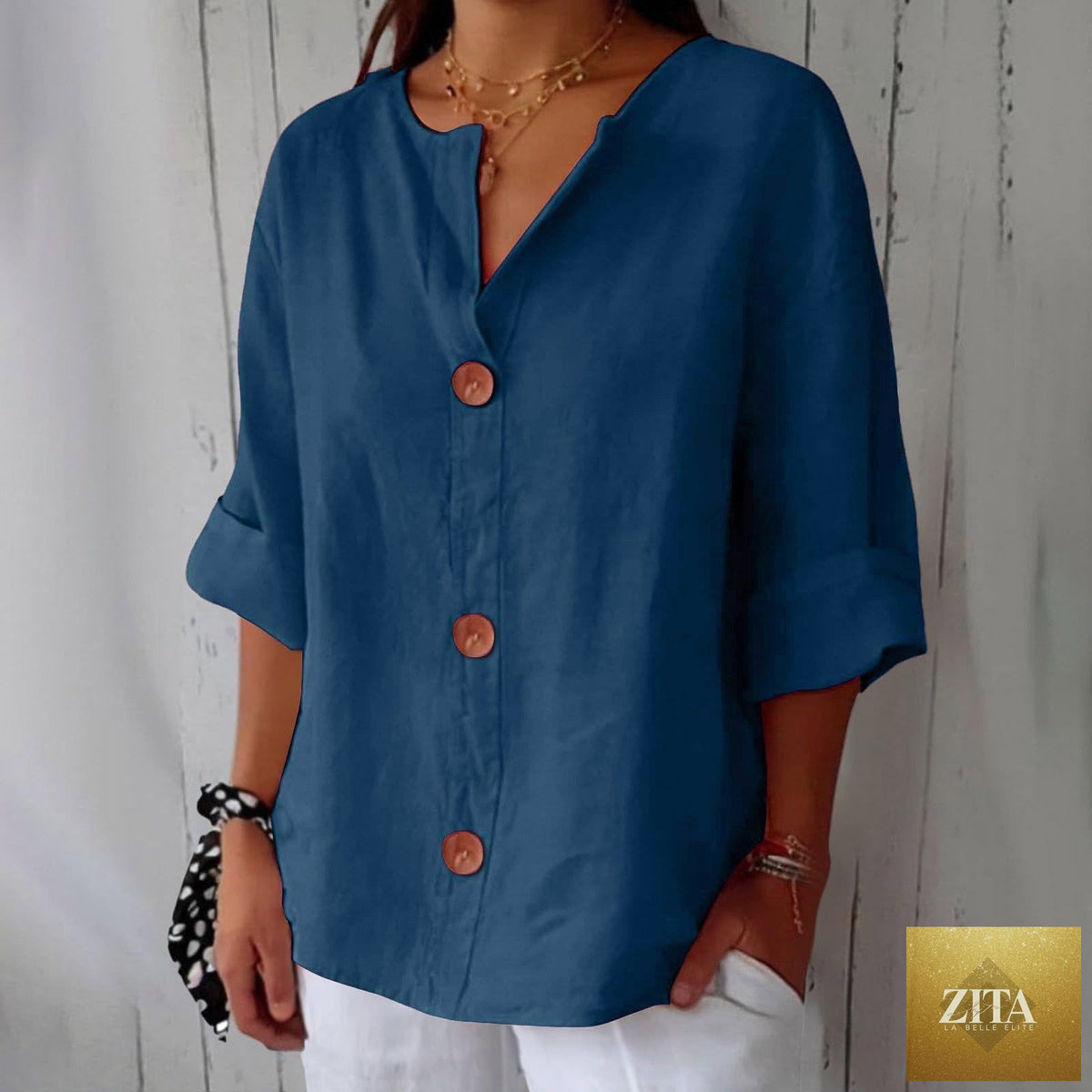 Women's V-neck cotton linen blouse with buttons, casualwear by FitiqueFit, shown in a relaxed fit with short sleeves and soft fabric.