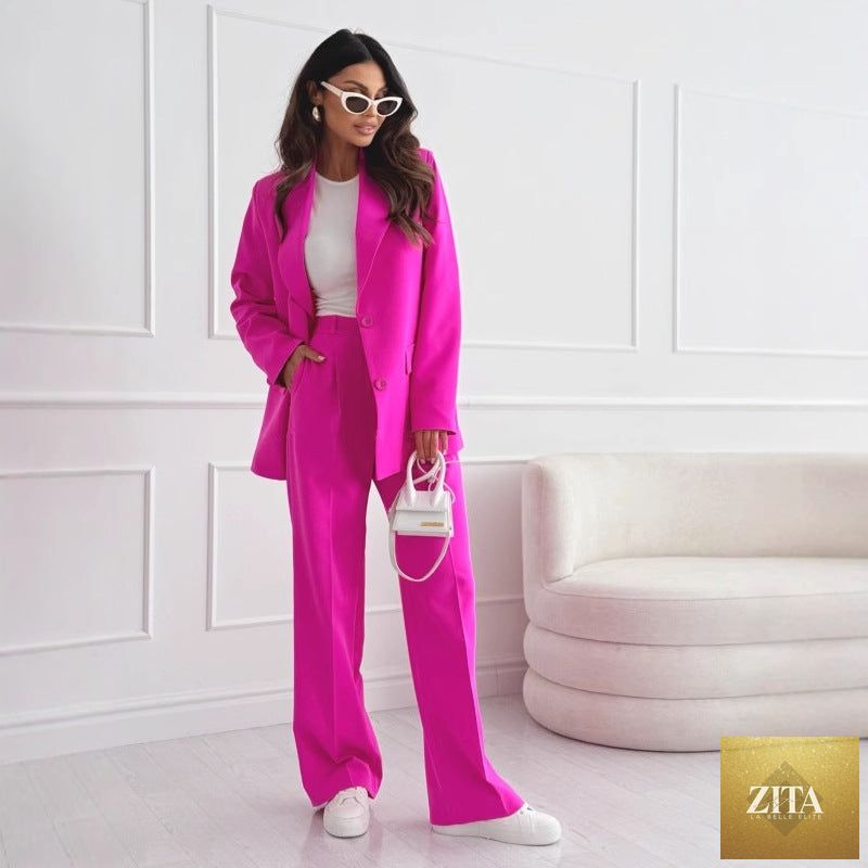 Women's professional blazer and trousers suit set by FitiqueFit, featuring long sleeves and full-length design.