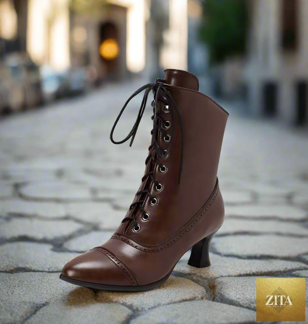 Women’s high heel Martin boots by Zita La Belle Elite, British style motorcycle footwear with leather finish and buckle details.