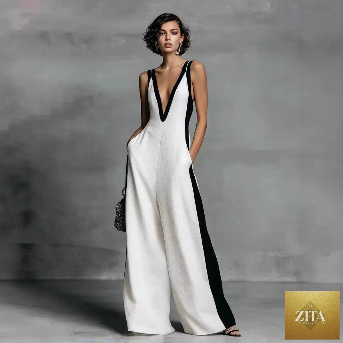 Women's sleeveless V-neck contrast color wide-leg jumpsuit by Zita La Belle Elite, casualwear with a stylish, relaxed fit.