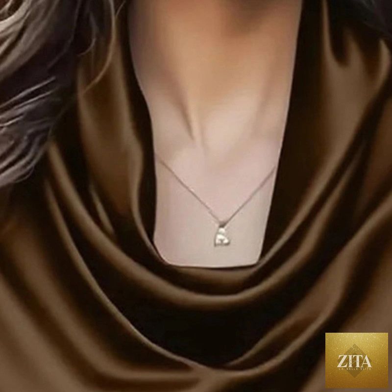 Women's elegant draped neck blouse by FitiqueFit, showcasing casualwear style with a sophisticated neckline and comfortable fit.