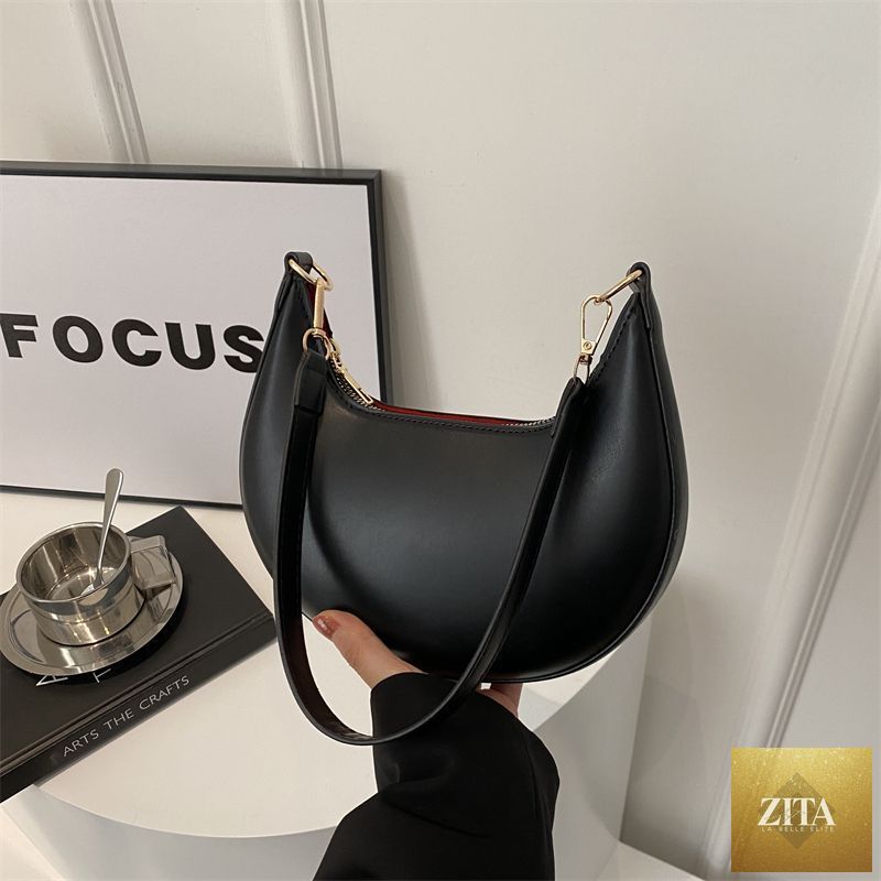 Social Buzz eSIMs Niche Crescent textured shoulder bag for women, stylish all-match design with simple, elegant details.