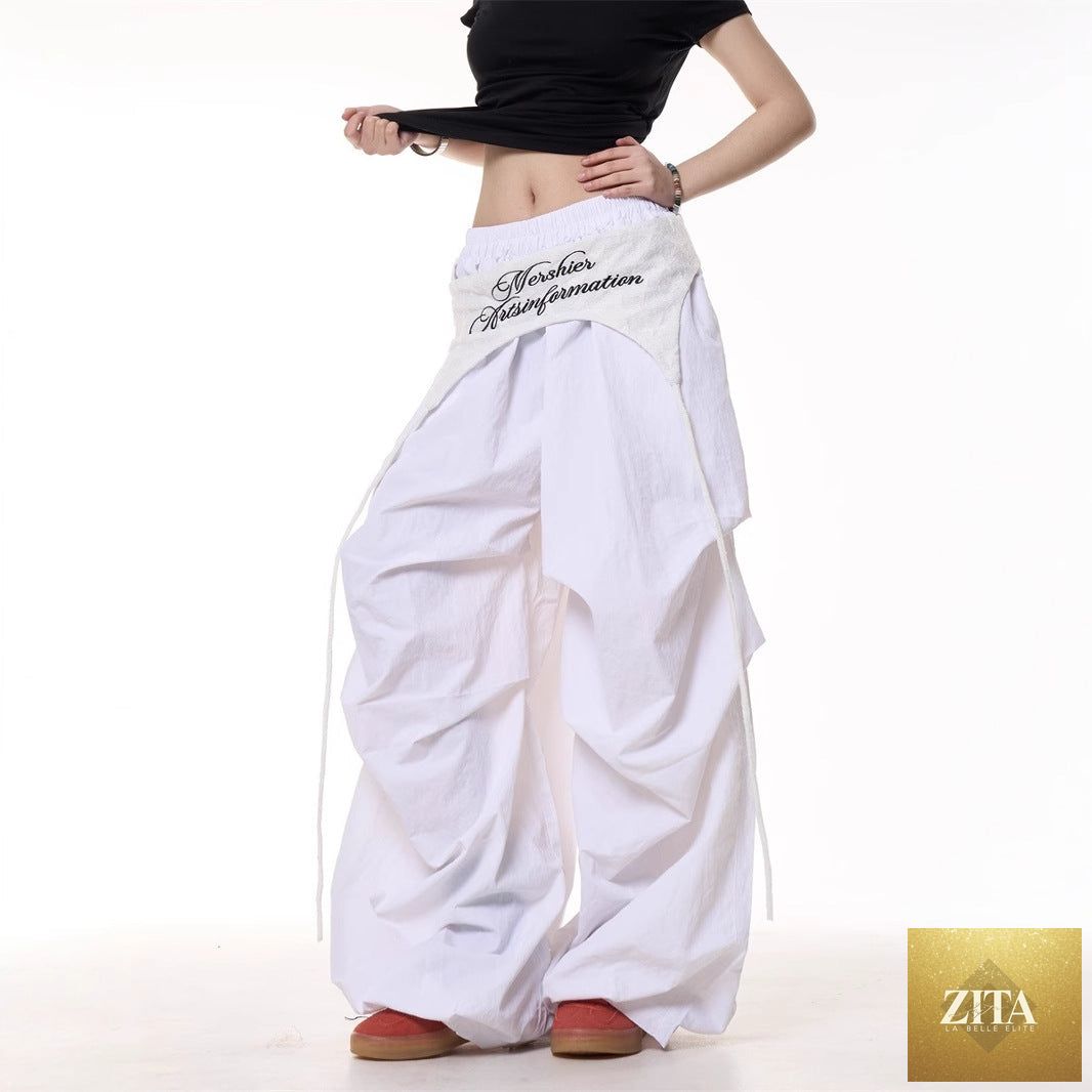 Relaxed women's casual American-style layered cargo pants with tie details, featuring multiple pockets and a comfortable fit.